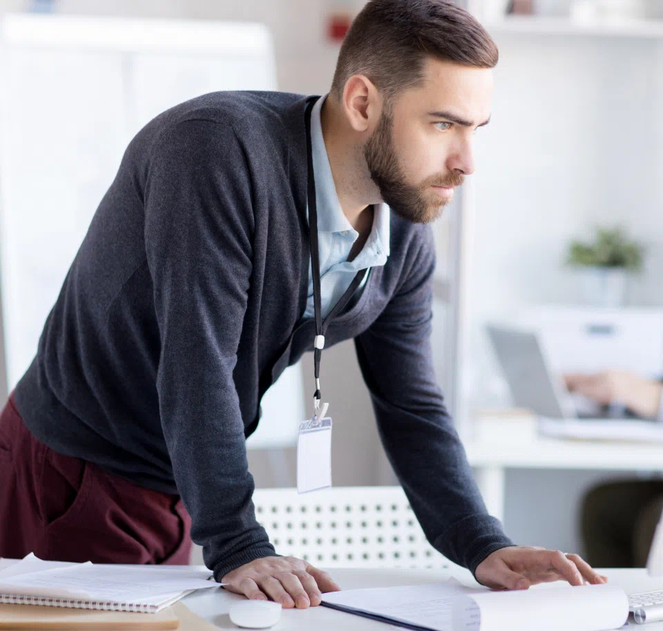A TrueNorth IT employee working at a computer